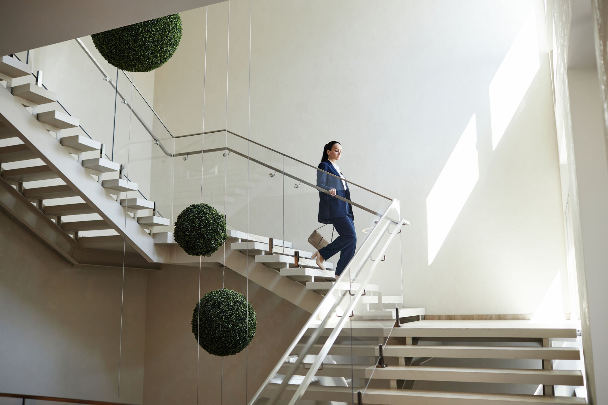 woman walking down the stairs