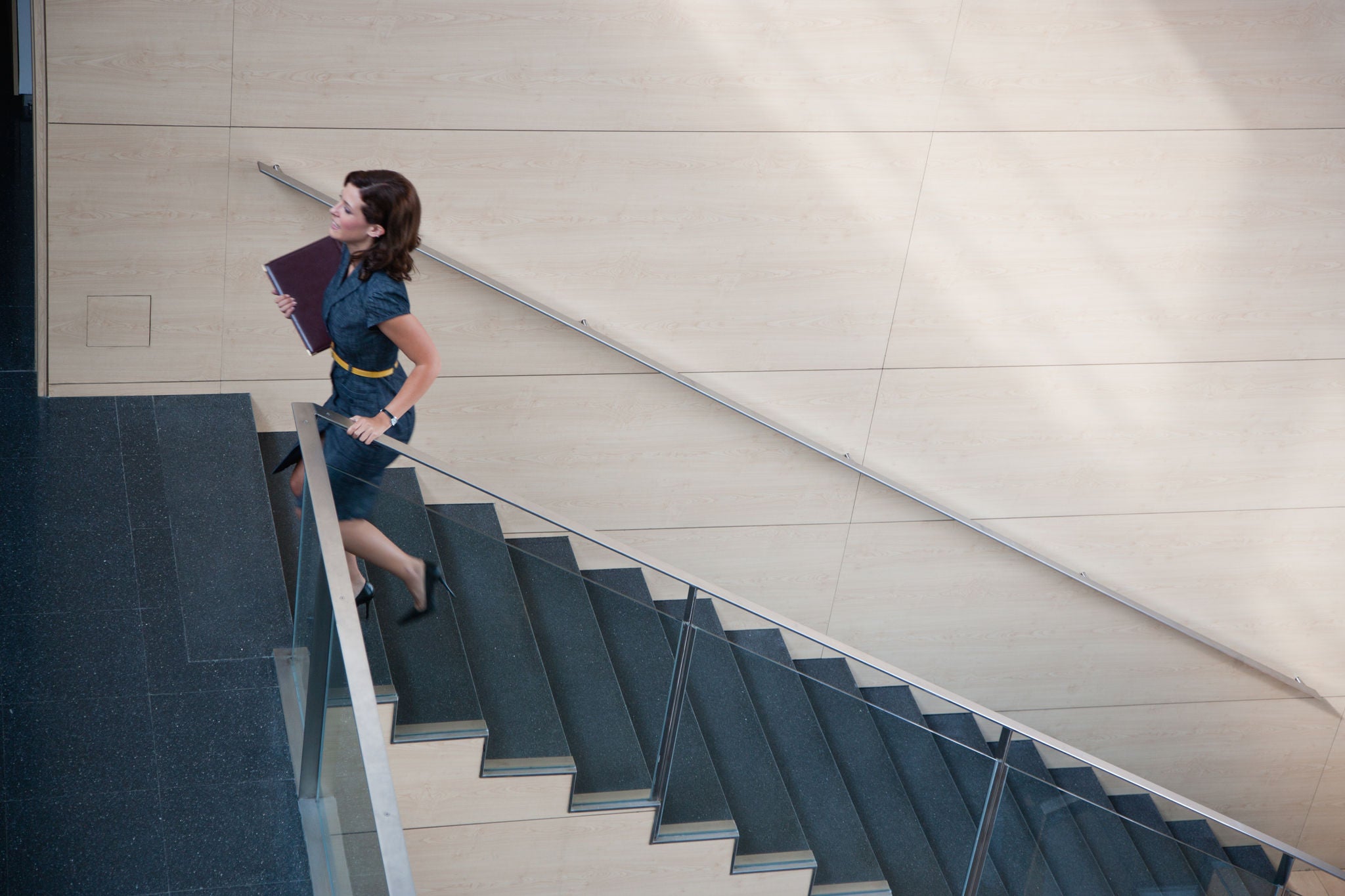 woman walking up the stairs
